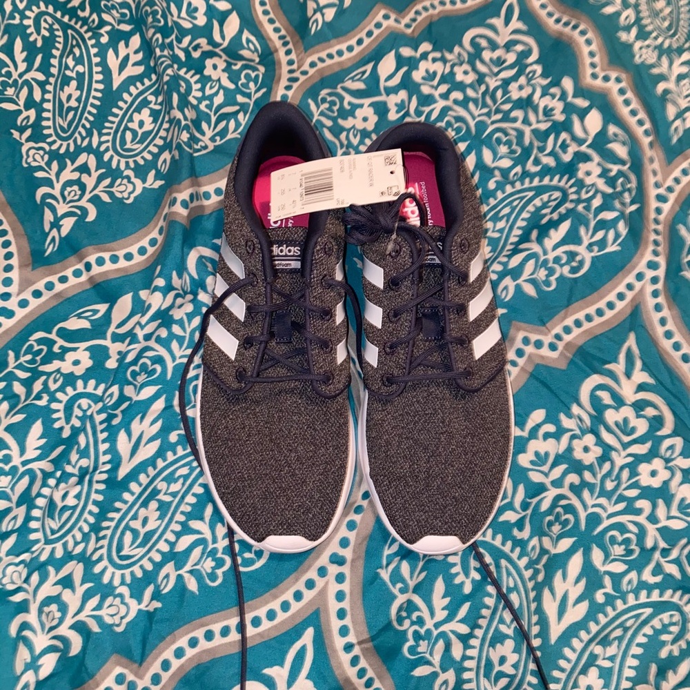Adidas foam shoes.